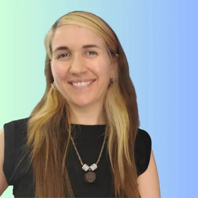 A woman with long hair wearing a black shirt.